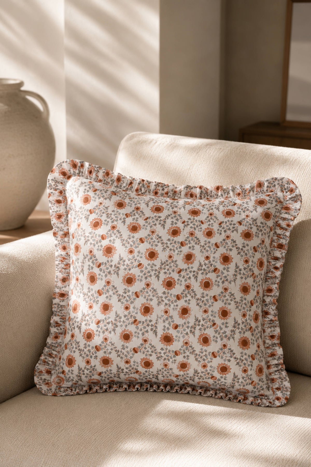 Floral ruffle pillow cover with gathered edge, orange medallions on light blue