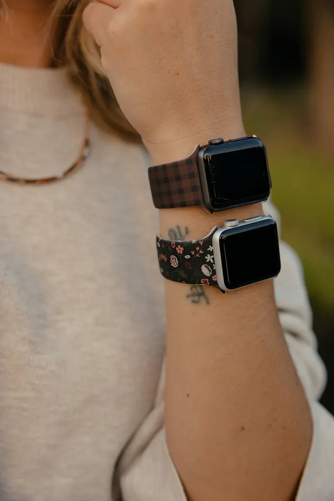 Floral watch band close-up on wrist with square smartwatch display