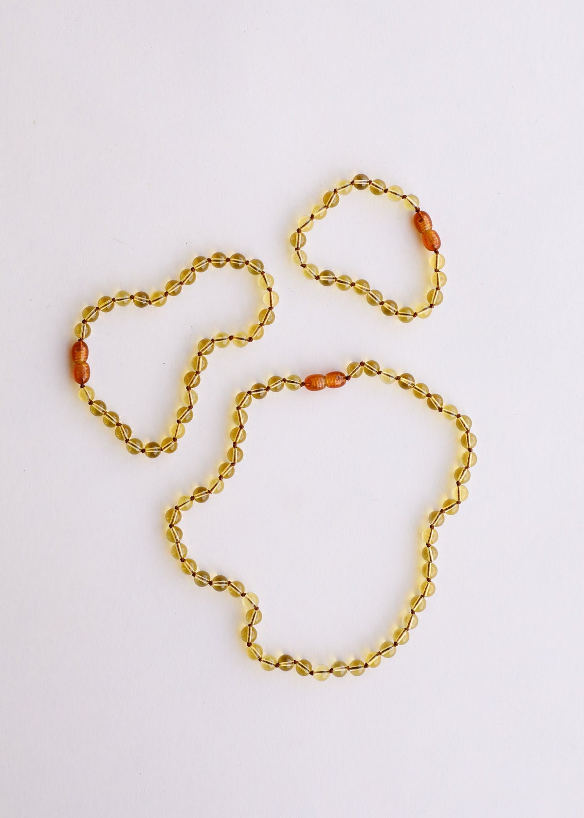Set of citrine gemstone beaded anklet/bracelet pieces, golden beads with orange accents