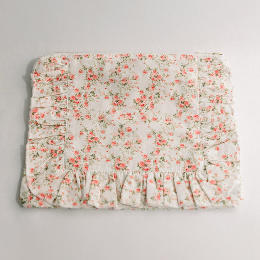 White floral ruffle zipper pouch, side view with vertical pleats