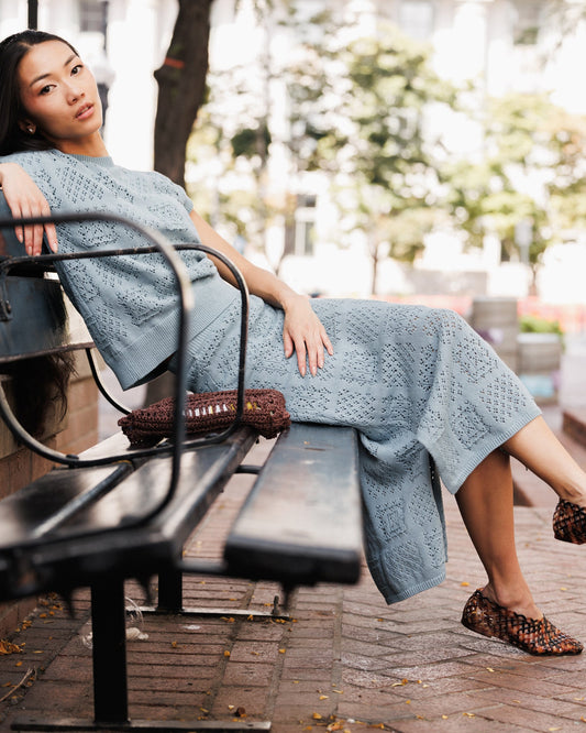 Smoke blue textured knit midi skirt with front slit and high-waist fit