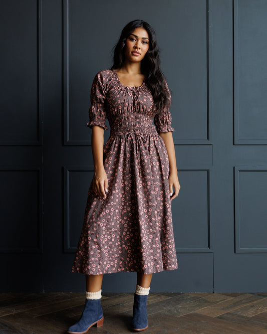 Dark rose floral midi dress with round neckline and puff sleeves