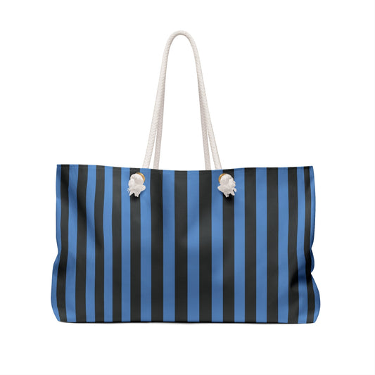 Blue and gray striped weekender bag with white rope handles and side pleats