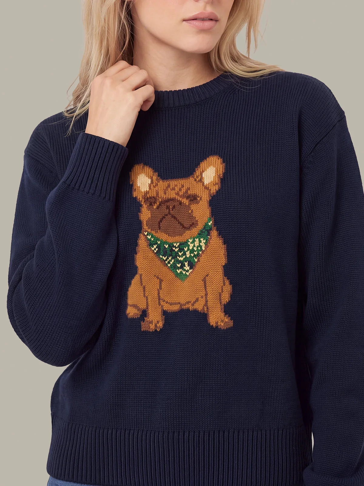 Navy crewneck knit sweater with dog face graphic and green bandana, ribbed neckline