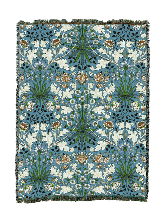 Blue-toned hyacinth blanket with botanical blossoms and tassel fringe border