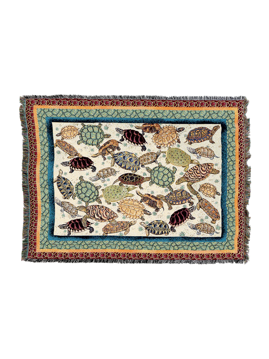 Rectangular turtles blanket, light center with multicolor turtle illustrations and trim border