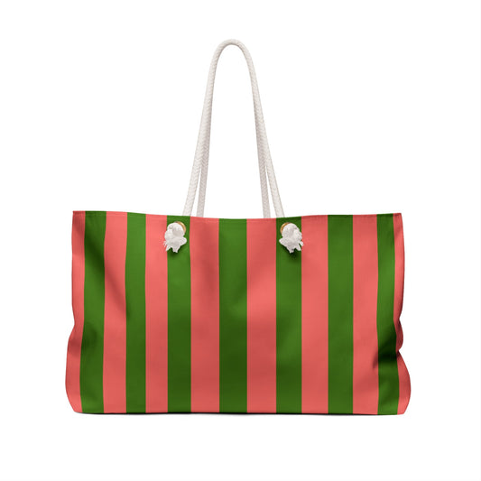 Green and coral striped weekender tote with white rope handles, side view