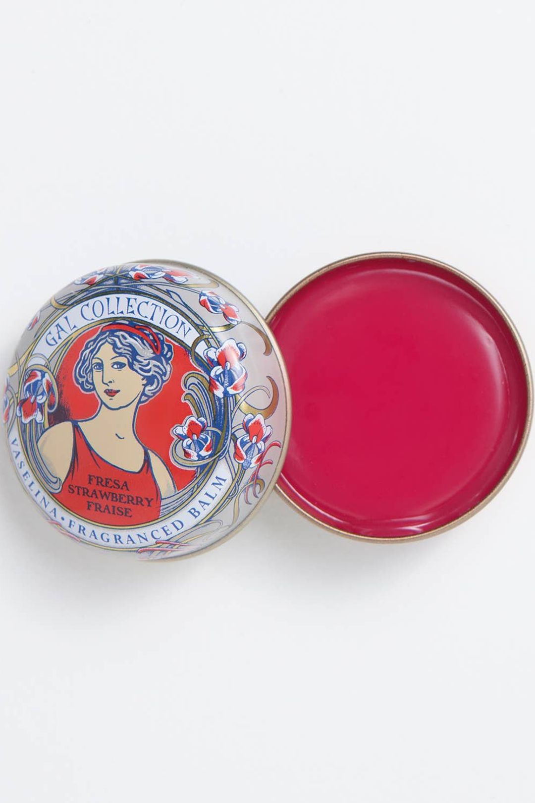 Perfumeria Gal strawberry-scented lip balm in a tin with a deep pink balm