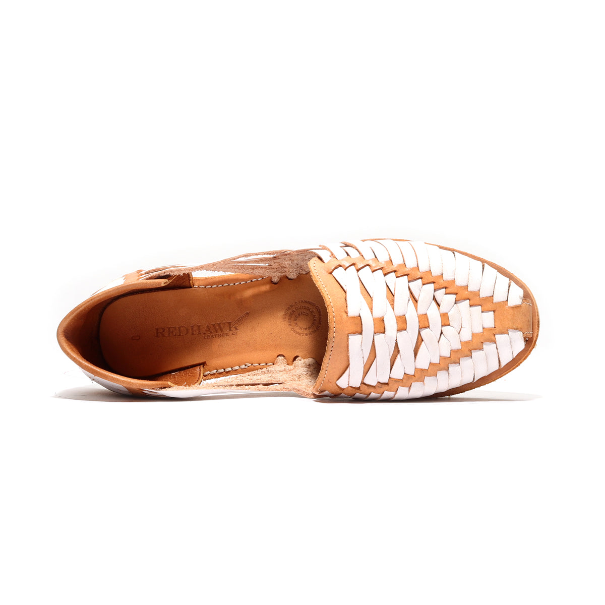 Women’s huarache sandal showing tan interior and white cross-woven upper