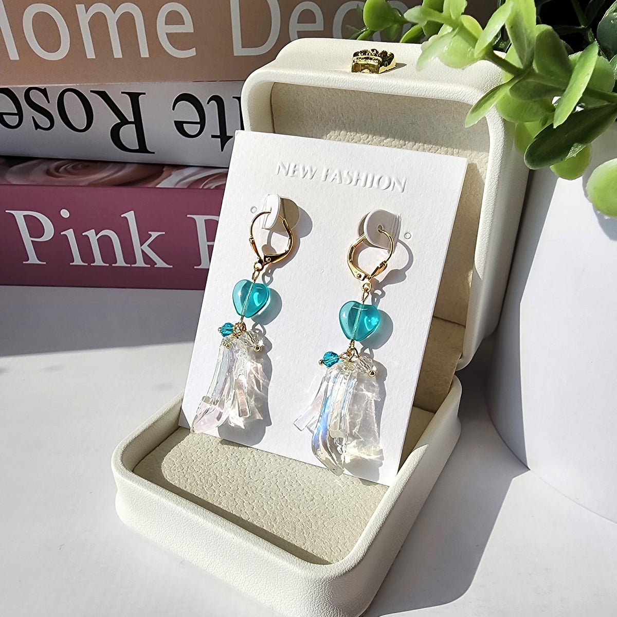 Cinderella glass slipper earrings on display cards with turquoise hearts and clear slippers