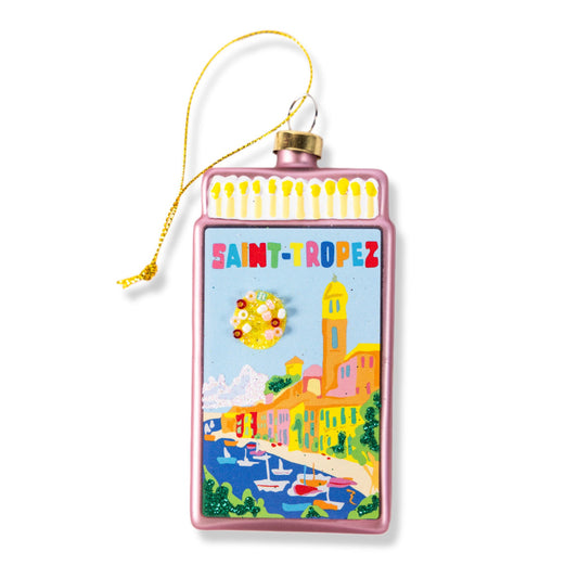 Pink matchbook ornament with gold tassel, St. Tropez illustration and yellow border