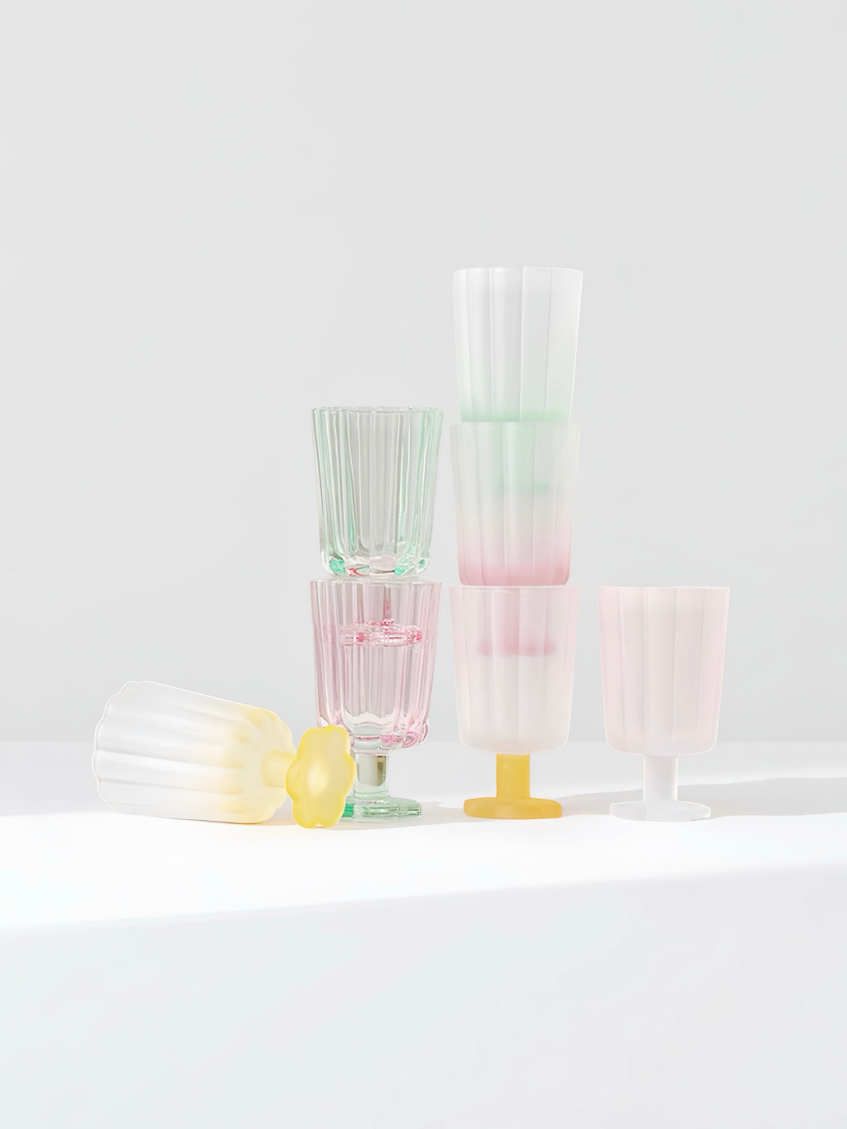 Pastel hand-blown petal goblets with mint, pink, and white cups