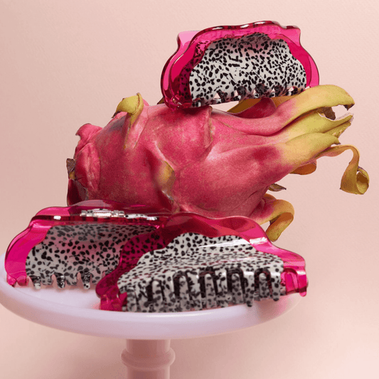 Dragon fruit hair claw with pink frame and leopard-print teeth for holding hair