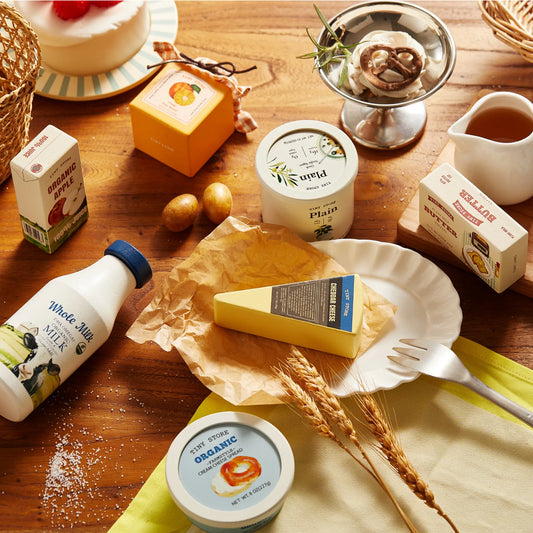 Mini dairy play assortment with milk bottle, cheese tub, butter block, and cartons