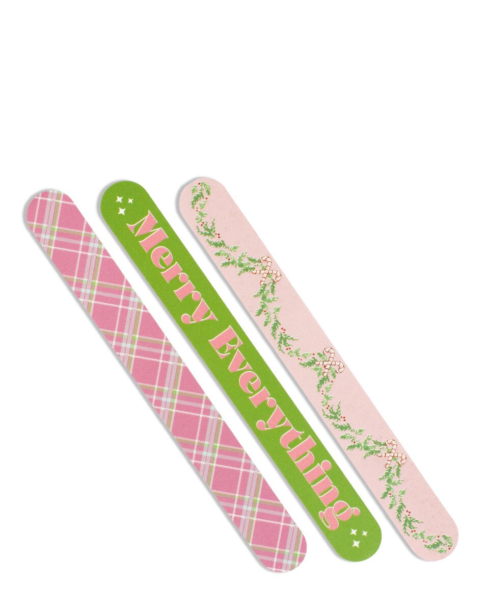 Three festive nail files with Merry Everything patterns in pink, green, and cream