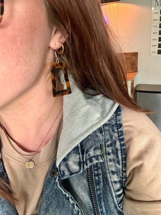 Leopard acrylic rectangular earrings with gold-tone fishhook backs, side view