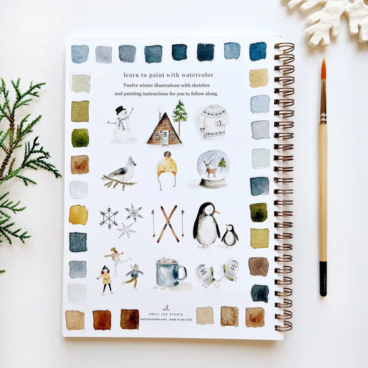 Spiral watercolor workbook cover with penguin, house, and animals plus instruction text