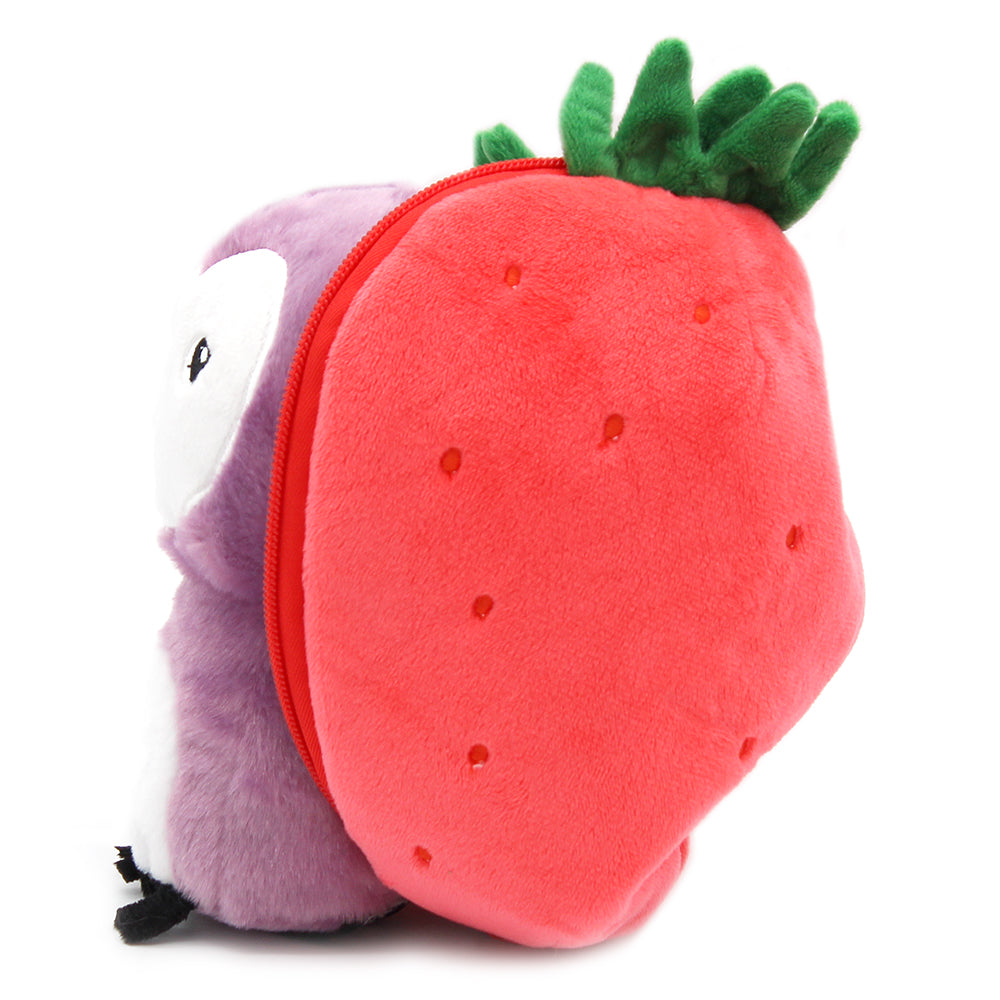 Purple owl plush beside red strawberry pouch with green leaves