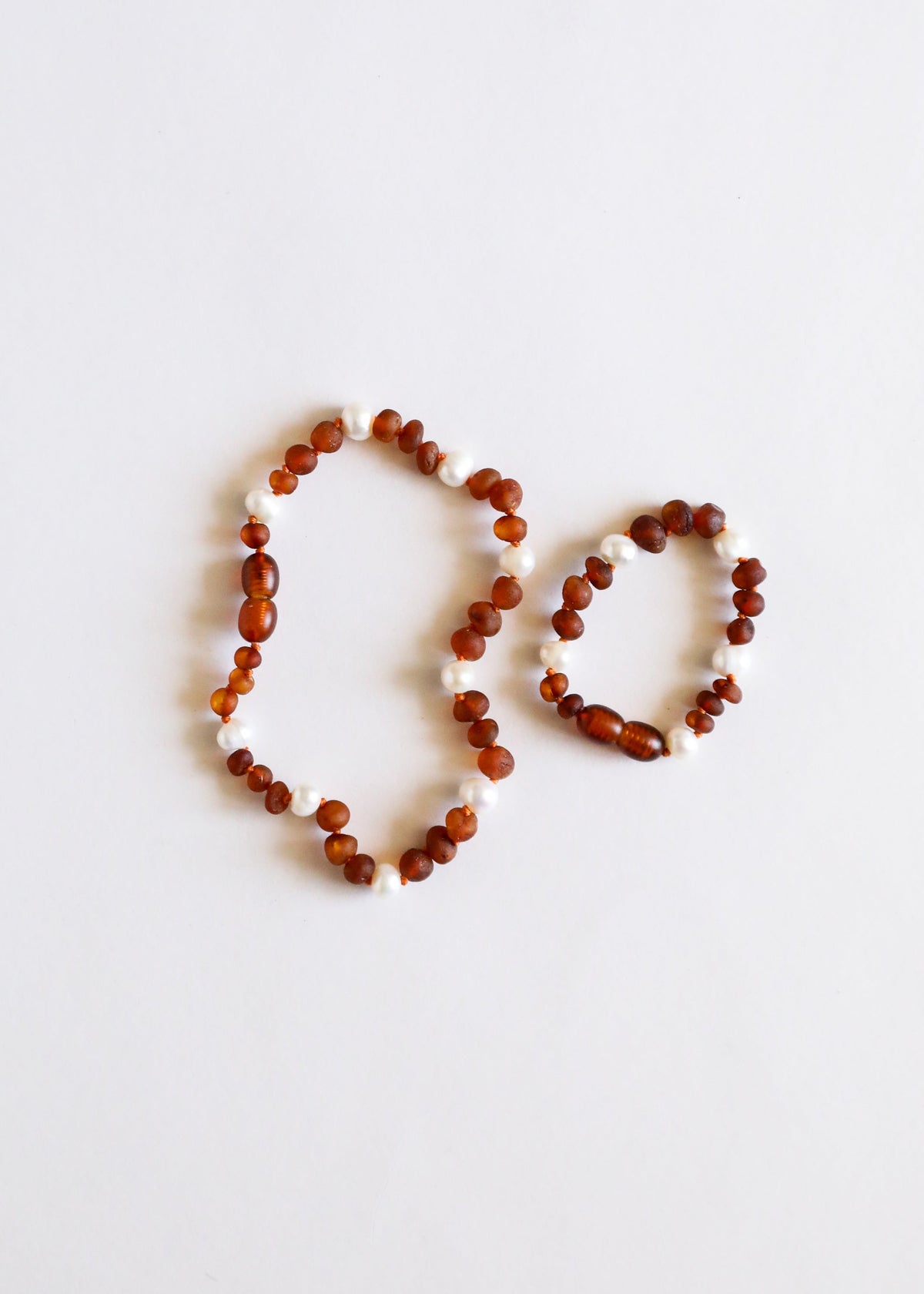 Cognac amber bead anklet and bracelet with white pearl halo accents