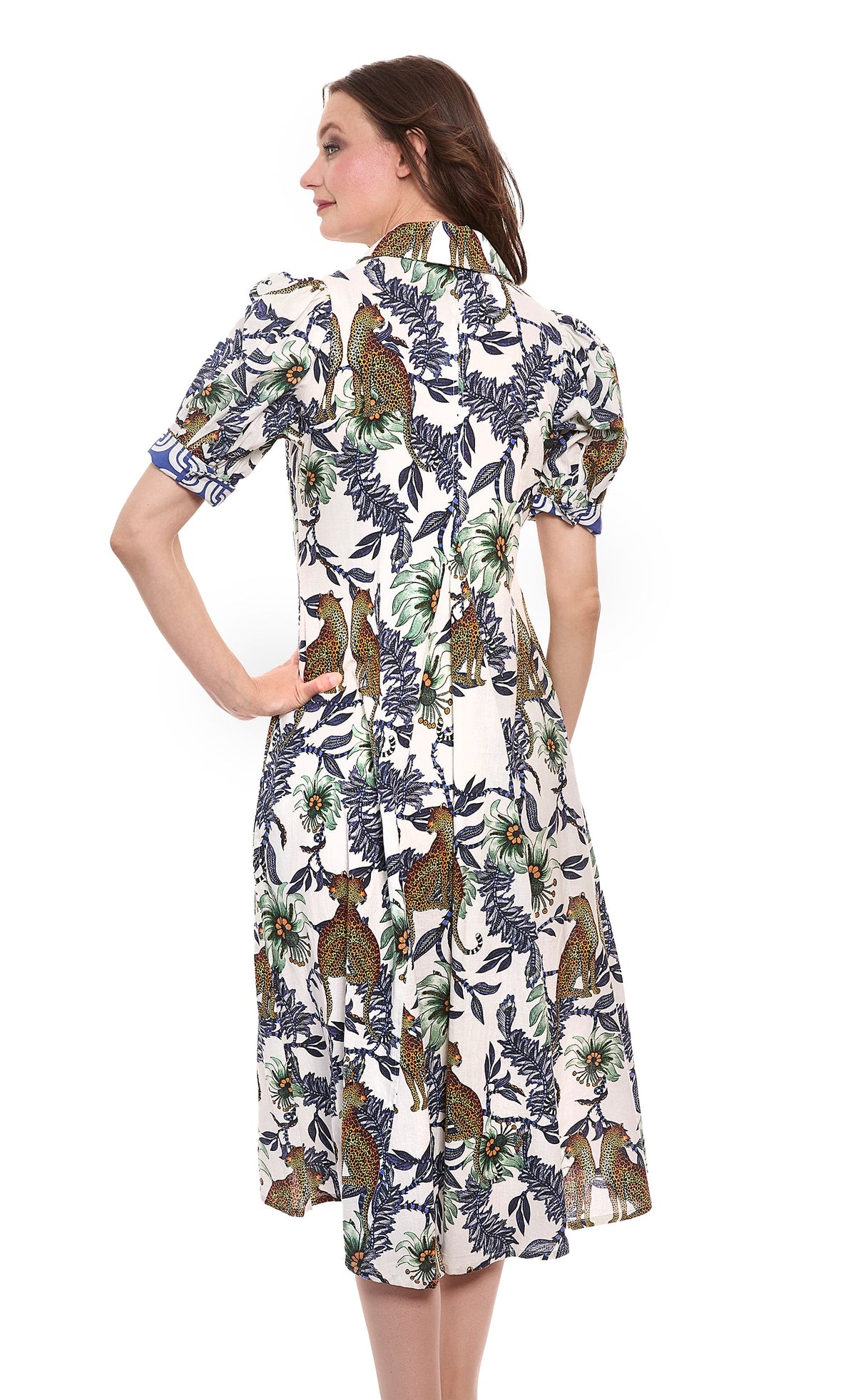 White V-neck dress with jungle cheetah and floral print, short sleeves, side view
