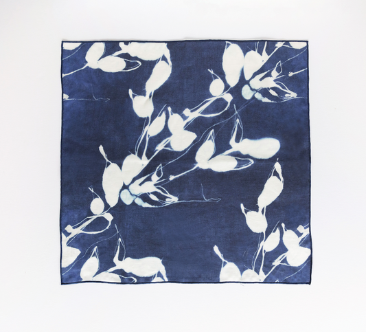 Indigo napkin with white botanical Porto print, rectangular