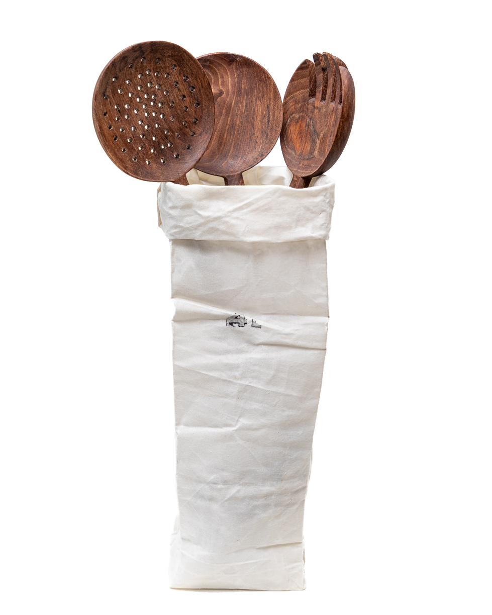 Walnut long-handle spoon set of 3 standing out of a paper bag