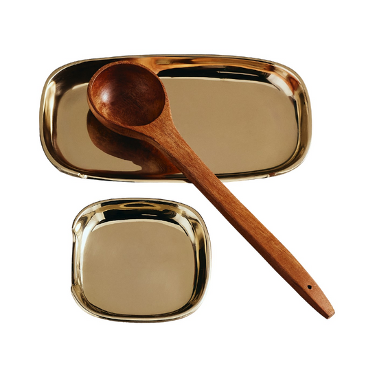 Oval gold spoon-rest tray with matching brown wooden spoon