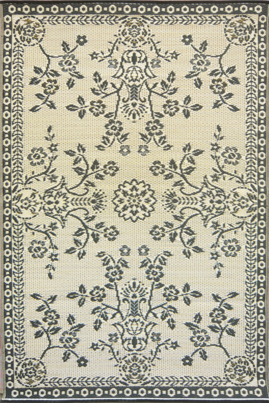 Tan-and-black floral and vine area rug with ornate central motif and border