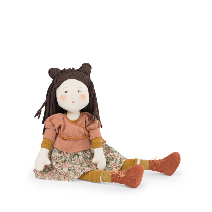 Seated cloth rag doll with dark brown yarn hair, terracotta top, floral skirt, mustard leggings