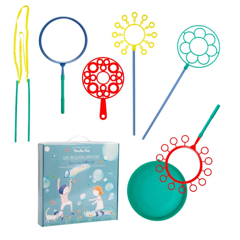 Assorted giant bubble wands with a teal soap container and Moulin Roty set box