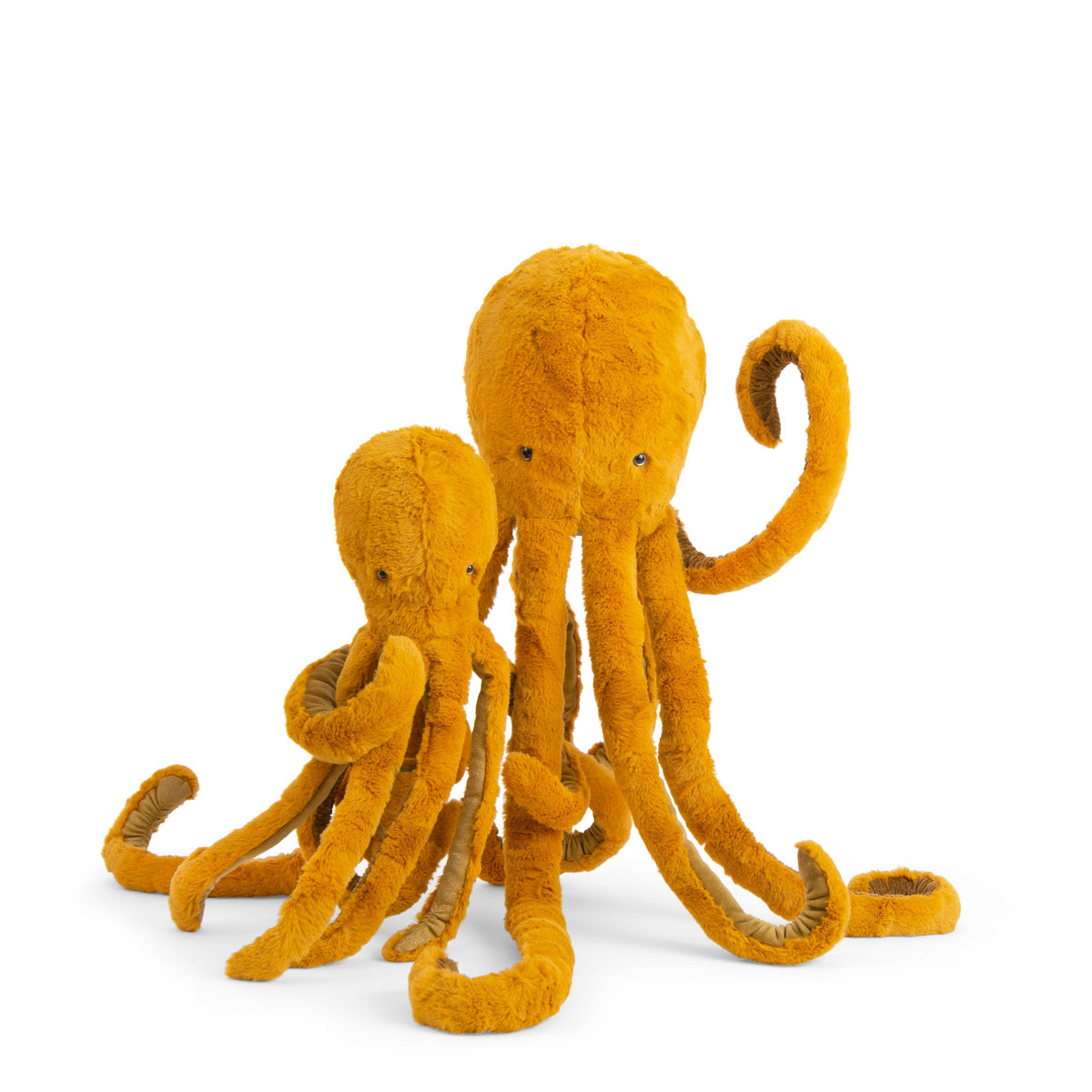Two golden plush octopuses, large and small, with long curled tentacles