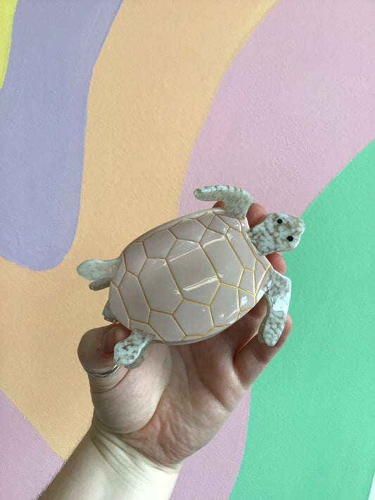 Sea turtle hair claw with cream shell and light blue spotted flippers