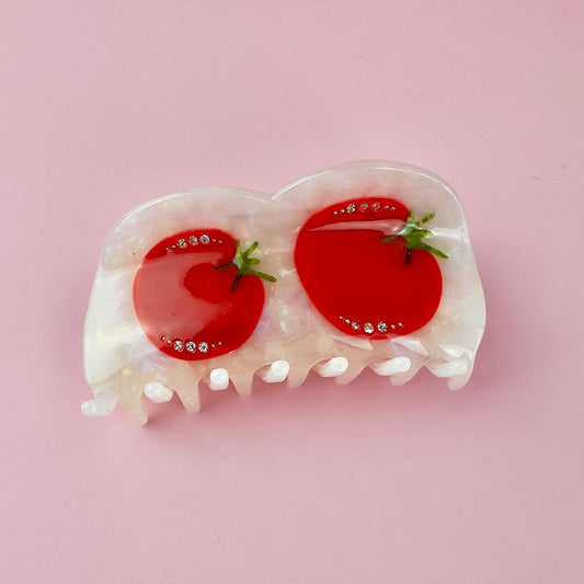 Tomato-themed hair claw clip with two red tomato slices and rhinestone dot accents