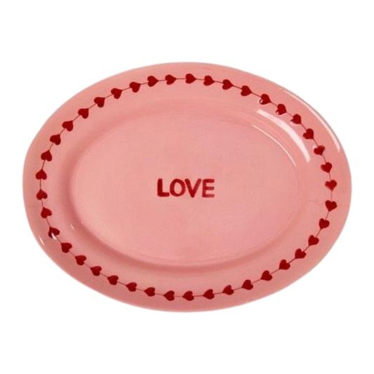 Pink ceramic serving platter with red heart border and LOVE lettering