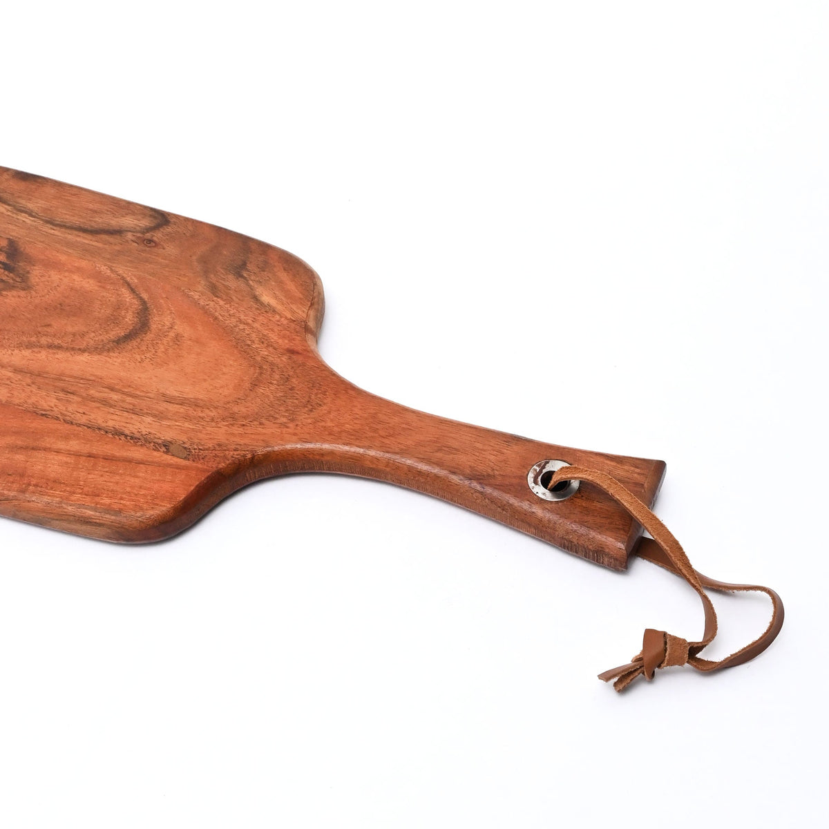 Wooden paddle cutting board handle with metal eyelet and attached leather cord