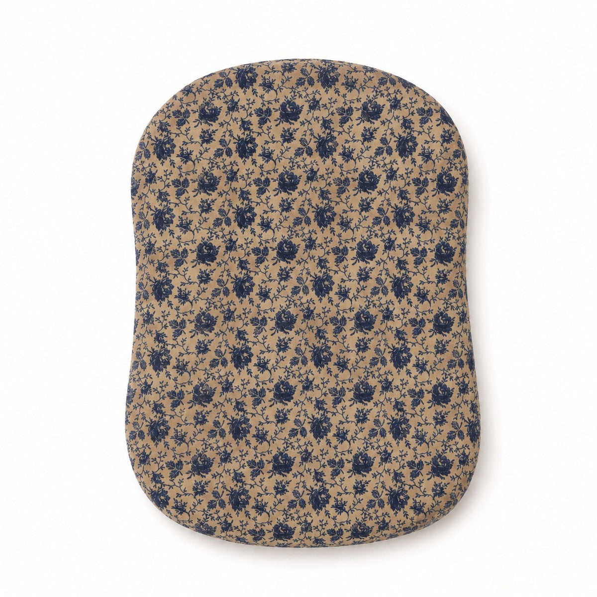 Baby lounger cover with a blue floral print on a tan ground and smooth edges