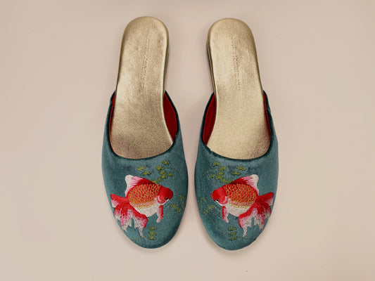 Pair of teal velvet mules with red and orange goldfish embroidery, beige lining
