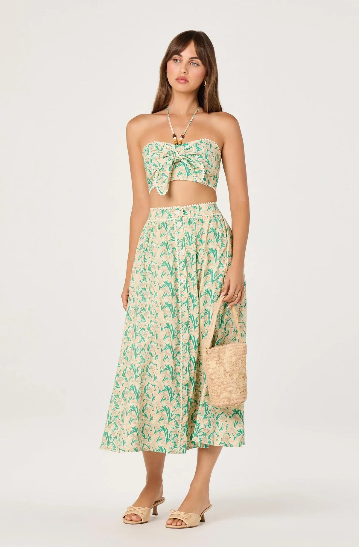 Floral halter crop top with gathered bust and scalloped edge trim, teal and cream