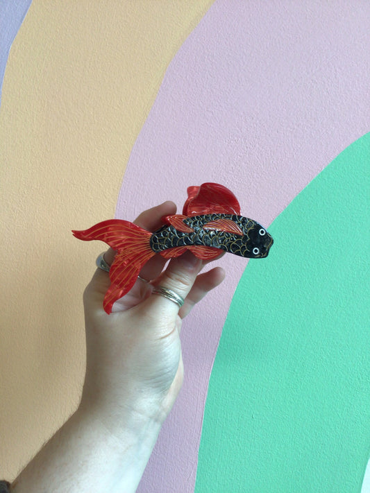 Koi fish hair claw with dark teal body and red flowing fins