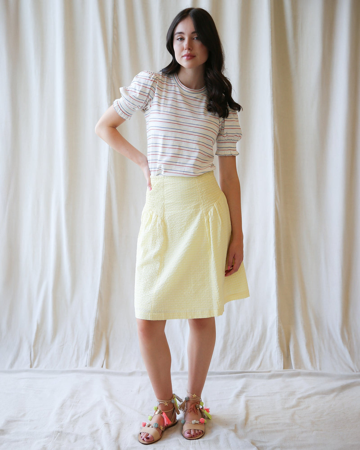 Women’s striped puff-sleeve top with crew neck and gathered ruffle cuffs