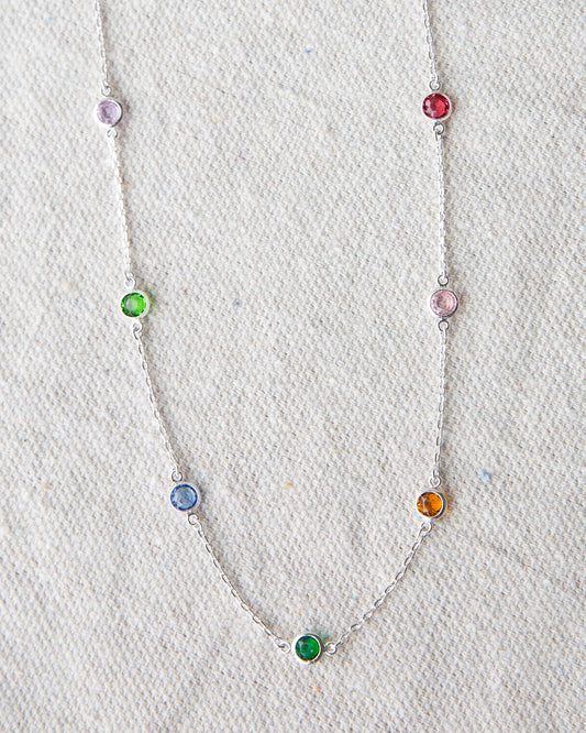 Silver-tone chain necklace with multicolor round gemstone beads, close-up front