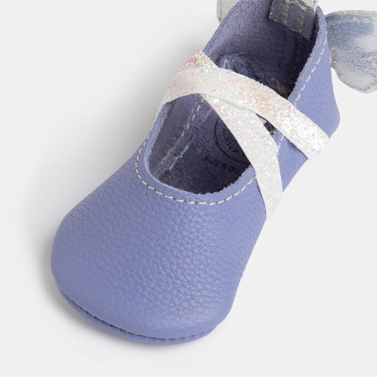 Lilac baby ballet slipper with arched cutout strap, bow detail, and fluttery wings
