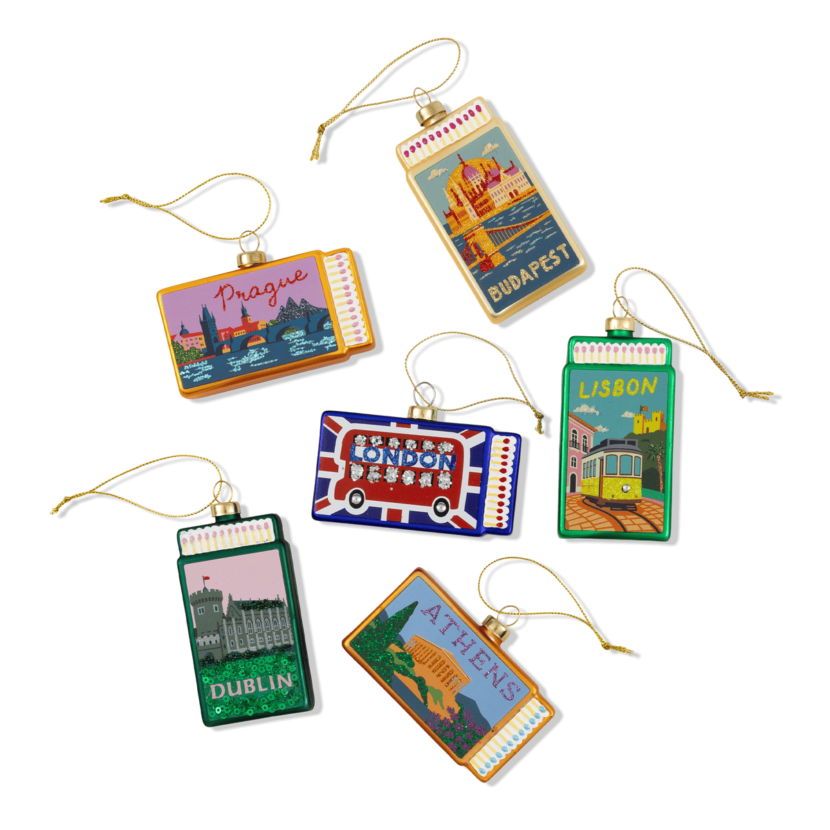 Assorted city matchbook ornaments with hanging cords and metal tops, multiple designs