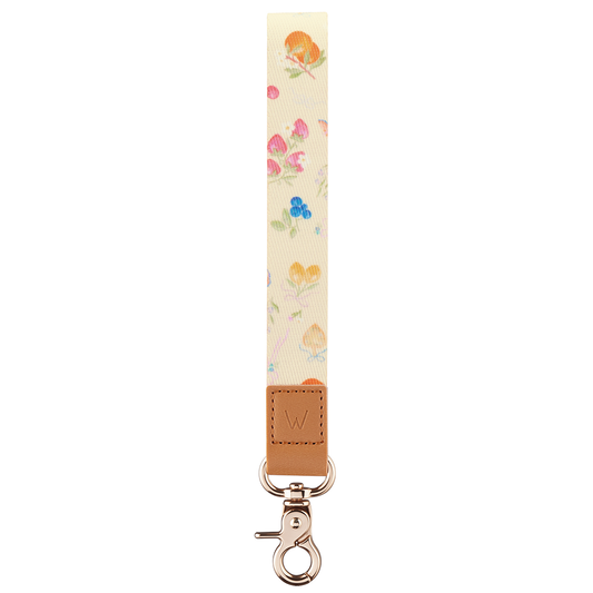 Beige berry-print wrist lanyard with brown leather tab, keyring clasp, and swivel hook