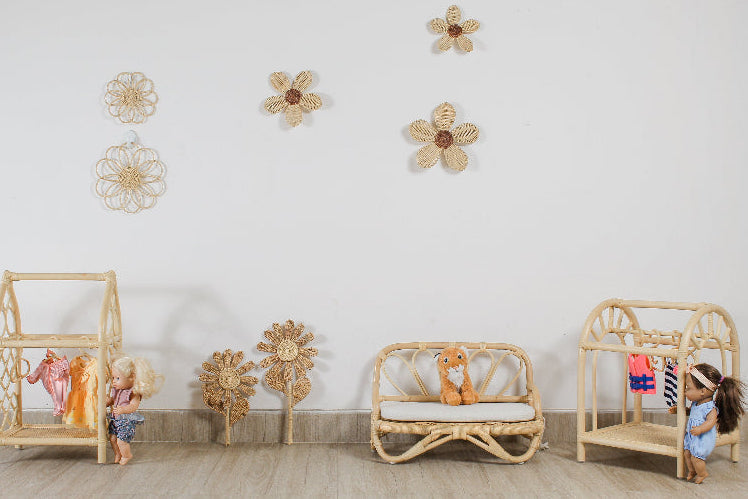 Rattan flower wall hangings with woven daisy and looped flower designs