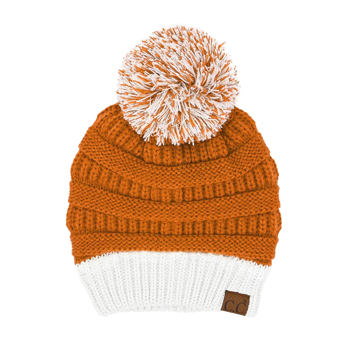 Burnt orange knit beanie with white pom-pom and C.C logo patch at cuff