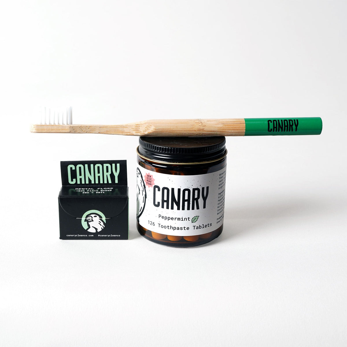 Peppermint toothpaste tablets with bamboo toothbrush and vegan dental floss