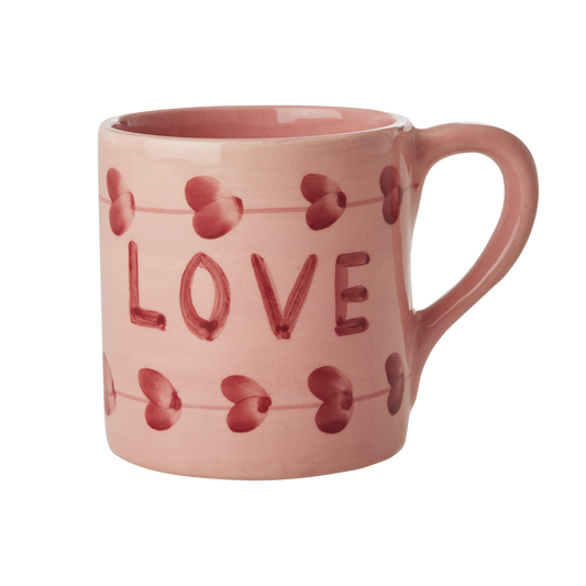 Pink ceramic mug with red heart pattern and hand-painted 'LOVE' text, 14.2 oz