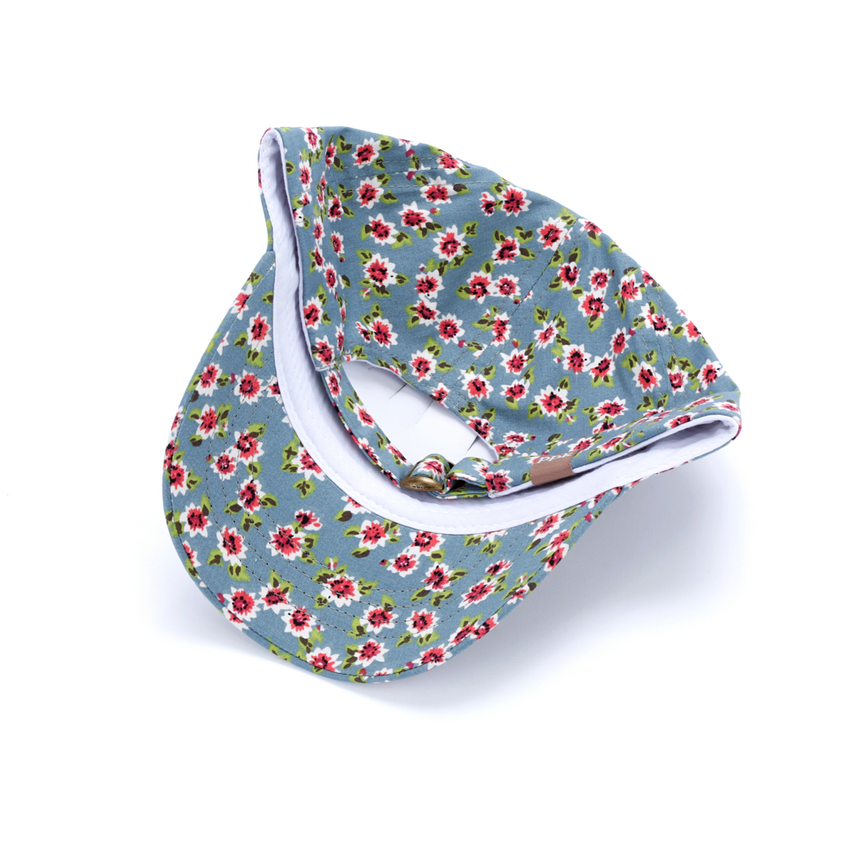 Blue floral baseball cap tilted to show the underside of its brim and crown.