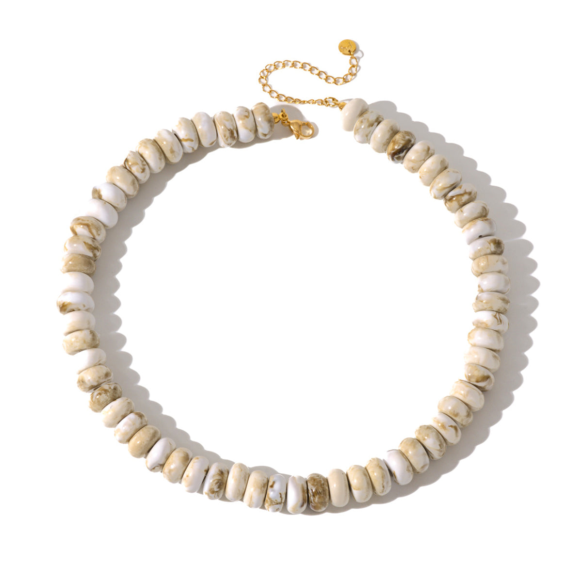 Marble ivory donut-bead necklace with gold-tone lobster clasp